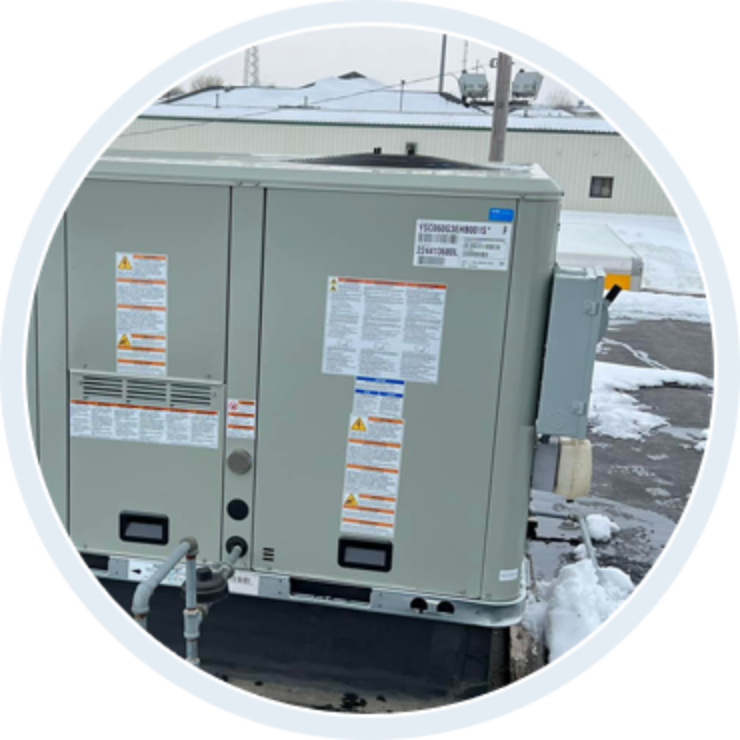 Commercial Rooftop HVAC Unit in Winter Conditions